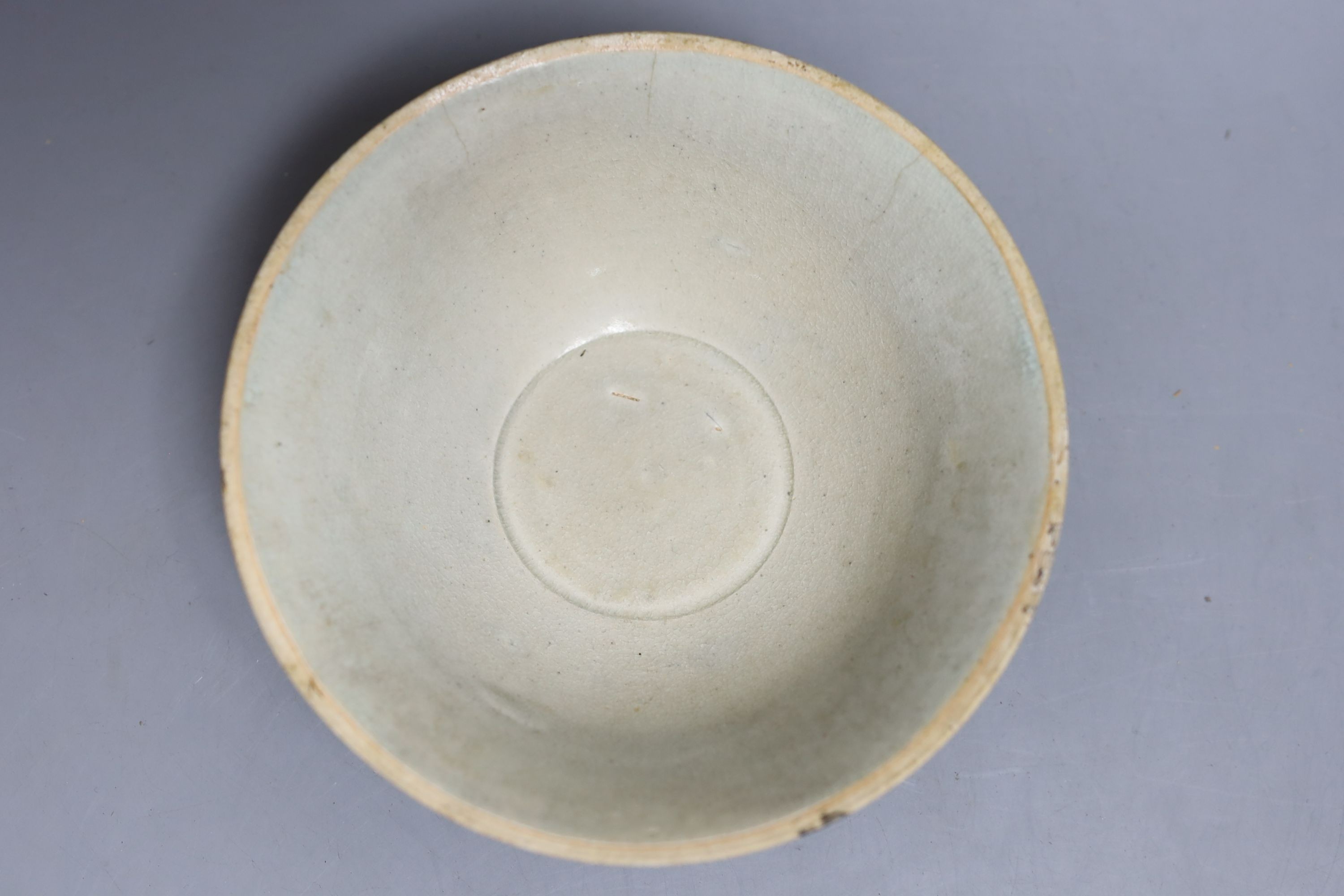 A Chinese Qingbai bowl and a Ge ware type shell dish, Yuan dynasty or later. Largest 18cm diameter